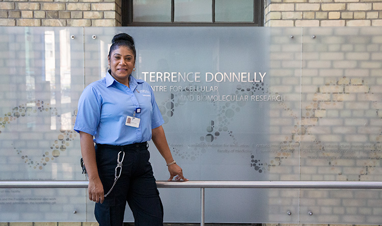 Patsy stands outside the Donnelly Centre for Cellular and Biomolecular Research.