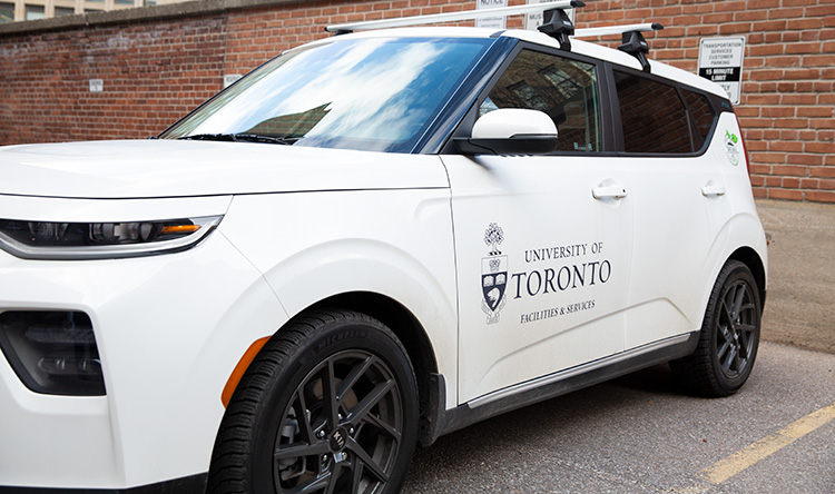 A Kia Soul EV electric vehicle on campus.