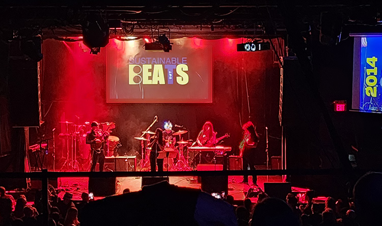 Sustainable Beats is performing on stage