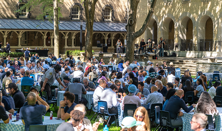 OREP staff gathered in UC Quad enjoying lunch