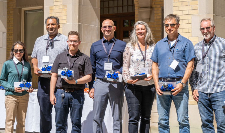 Project Leap team members posing with their awards