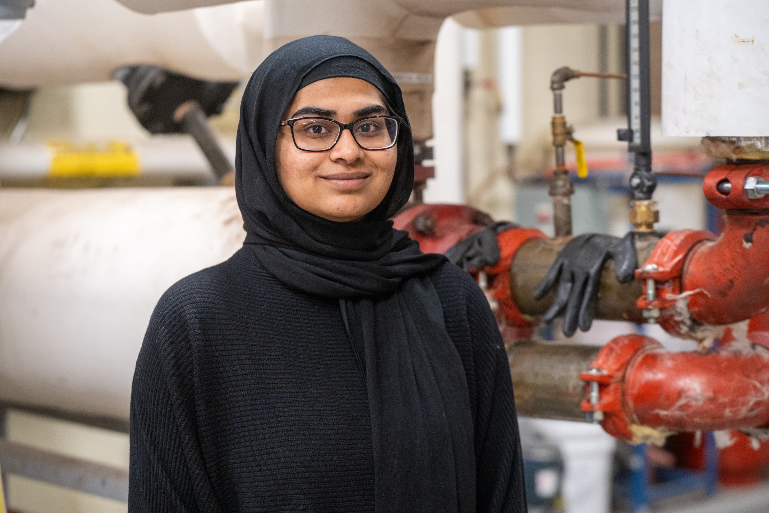 Fatima Hassan pictured on-site at U of T’s Central Steam Plant 