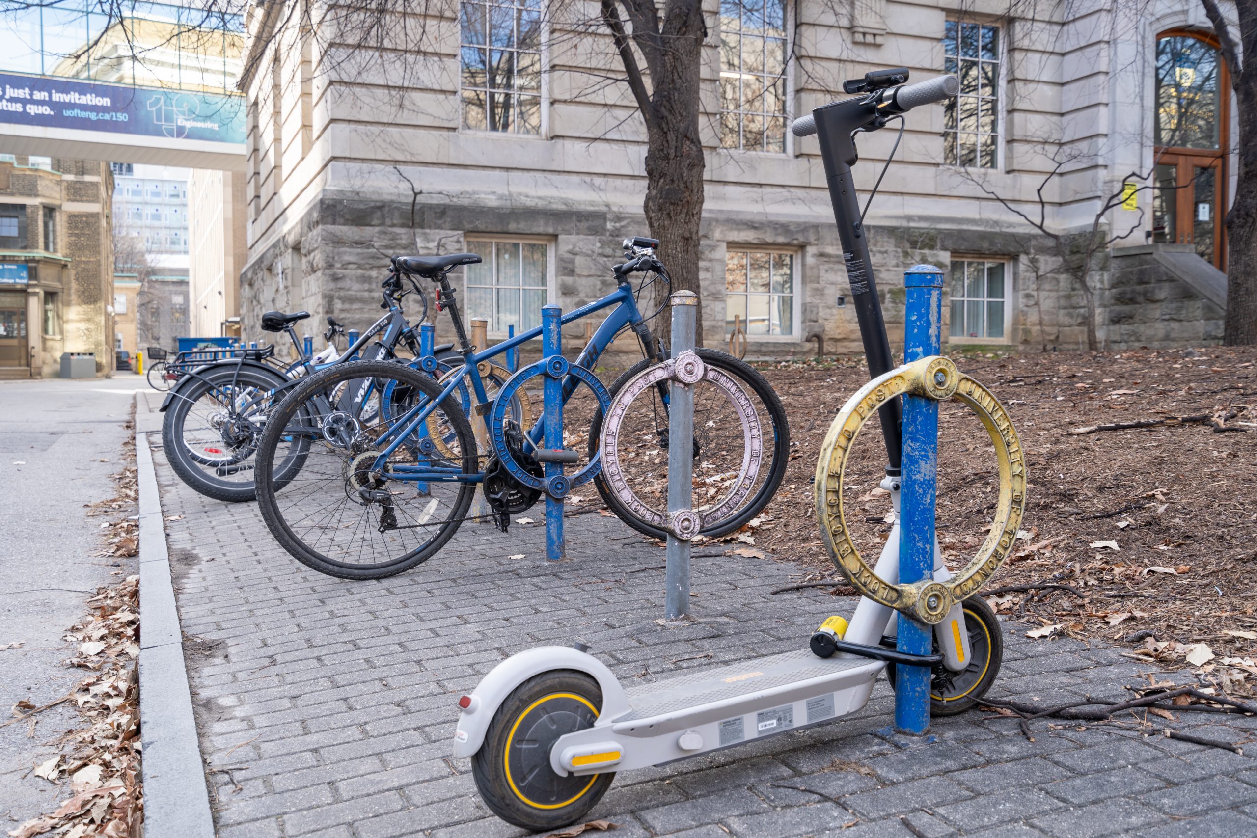 An e-scooter locked up on campus. 